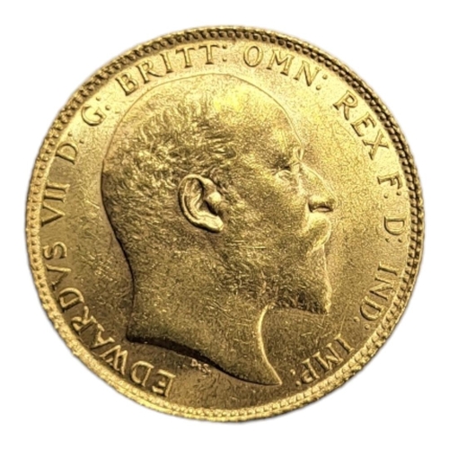 48A - A KING EDWARD VII 22CT GOLD FULL SOVEREIGN COIN, DATED 1909 
Having a portrait bust and George and D... 