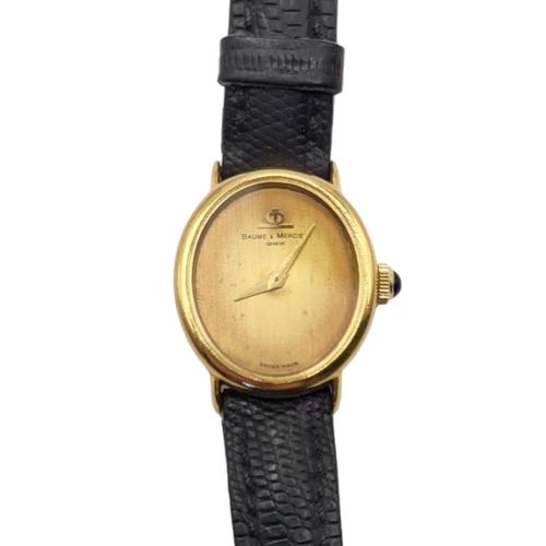 5 - BAUME & MERCIER, A VINTAGE 18CT GOLD LADIES’ WRISTWATCH
Oval form gold tone dial with sapphire winde... 