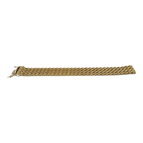 54 - WITHDRAWN A VINTAGE CONTINENTAL 18CT GOLD BRACELET
Forge links forming a textured design, in a fitte... 