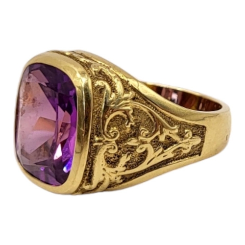 61 - A VINTAGE 14CT GOLD AND AMETHYST GENT’S SIGNET RING
The rectangular facet stone in a scrolled mount.... 