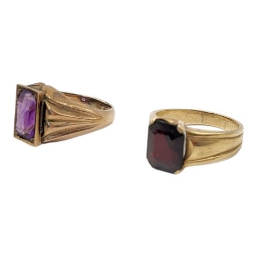 69 - TWO VINTAGE GENT’S YELLOW METAL AND GEM SET GENTS SIGNET RINGS 
Set with amethyst and garnet stones.... 