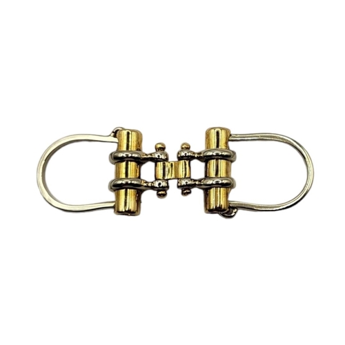 7 - GERALDO STACCO, A VINTAGE GOLD PLATED KEY RING
With white and yellow gold finish, in a velvet pouch ... 