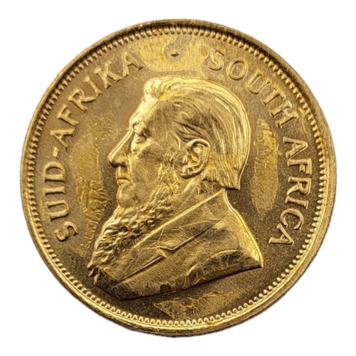 9A - A 22CT GOLD FULL 1OZ KRUGERRAND COIN, DATED 1975 
With portrait bust and springbok design to reverse... 