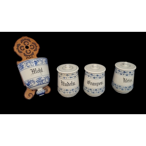 487 - A COLLECTION OF THREE EARLY 20TH CENTURY CONTINENTAL BLUE AND WHITE PORCELAIN STORAGE JARS
Marked ‘G... 