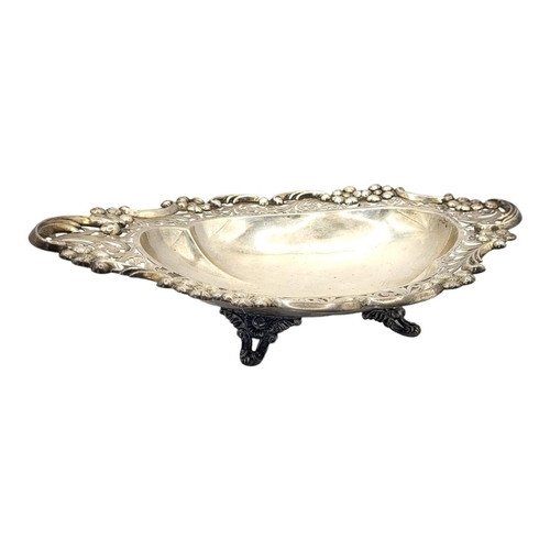 1 - AN EDWARDIAN SILVER SWEETMEAT DISH
Having a scrolled and pierced border, hallmarked S. Glass, Birmin... 