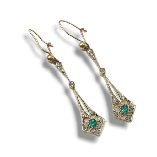 11 - A PAIR OF EARLY 20TH CENTURY 18CT GOLD, DIAMOND AND EMERALD DROP EARRINGS
The square cut emerald set... 