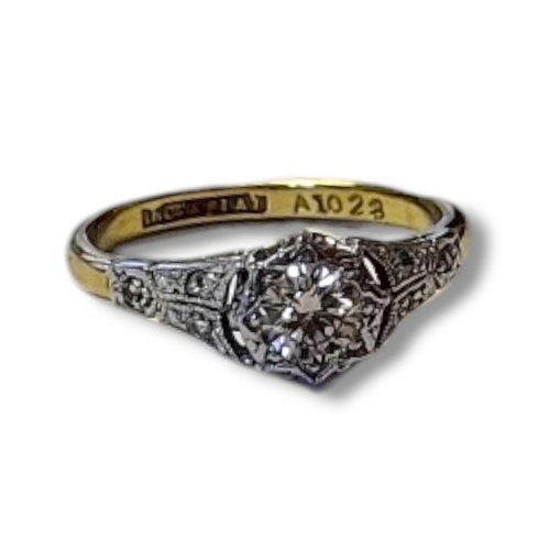 112 - AN EARLY 20TH CENTURY 18CT GOLD AND DIAMOND SOLITAIRE RING
Having a single round cut diamond and dia... 