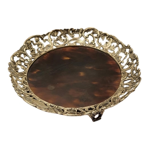 119 - WILLIAM COMYNS, A VICTORIAN SILVER AND TORTOISESHELL PIN TRAY
Having a pierced scrolled border with ... 