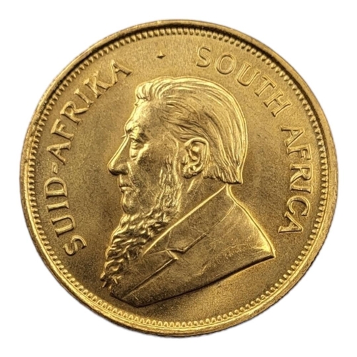 11A - A 22CT GOLD FULL 1OZ KRUGERRAND COIN, DATED 1975 
With portrait bust and springbok design to reverse... 