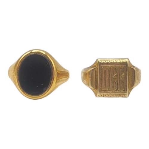 128 - A VINTAGE 9CT GOLD GENT’S SIGNET RING
Embossed initials ‘DCC’, together with a 9ct gold and onyx sig... 