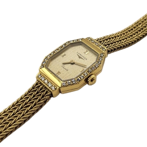 13 - LONGINES, A VINTAGE 18CT GOLD AND DIAMOND LADIES’ WRISTWATCH
The octagonal gold tone dial with diamo... 