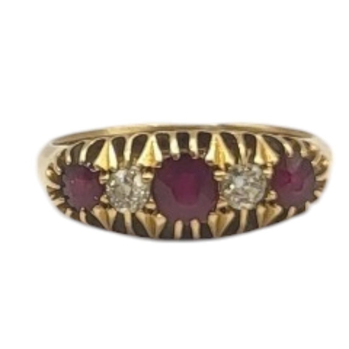 130 - AN EARLY 20TH CENTURY 18CT GOLD, DIAMOND AND GARNET FIVE STONE RING
Having a row of round cut garnet... 