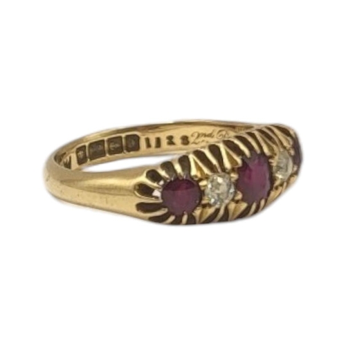 130 - AN EARLY 20TH CENTURY 18CT GOLD, DIAMOND AND GARNET FIVE STONE RING
Having a row of round cut garnet... 