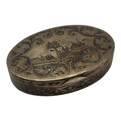 149 - A 19TH CENTURY RUSSIAN SILVER AND NIELLO ENAMEL OVAL SNUFF BOX
With Neillo landscape to lid and gilt... 