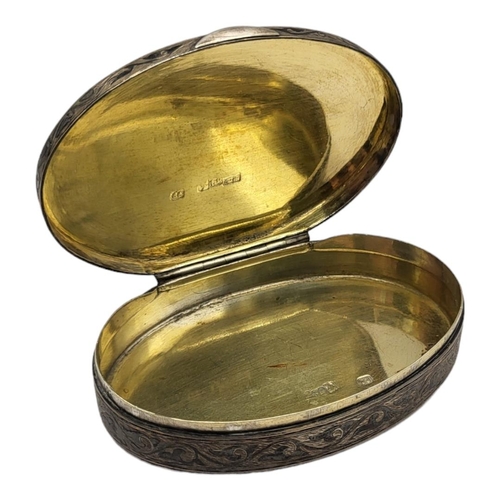 149 - A 19TH CENTURY RUSSIAN SILVER AND NIELLO ENAMEL OVAL SNUFF BOX
With Neillo landscape to lid and gilt... 