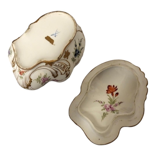 156 - AN EARLY 20TH CENTURY CONTINENTAL PORCELAIN BOX AND COVER
Rococo form, with fine hand painted floral... 