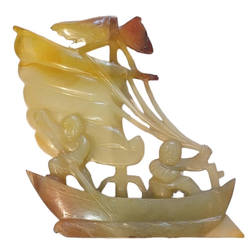 161 - A LATE 19TH/EARLY CHINESE JADE FIGURAL CARVING
Junk ship with figures.
(approx 12cm x 12cm)

Conditi... 