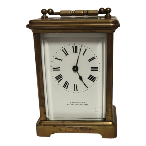 170 - A 20TH CENTURY GILT BRASS CARRIAGE CLOCK
Single handle and four bevelled glass panels, marked to dia... 