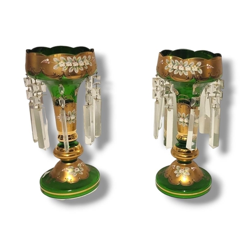 186 - A LARGE PAIR 19TH CENTURY BOHEMIAN GREEN GLASS LUSTRE VASES
Having overlaid gilt decoration with app... 