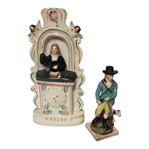 191 - A VICTORIAN STAFFORDSHIRE FLATBACK POTTERY STAND
Depicting John Wesley preaching a holy gospel, alon... 