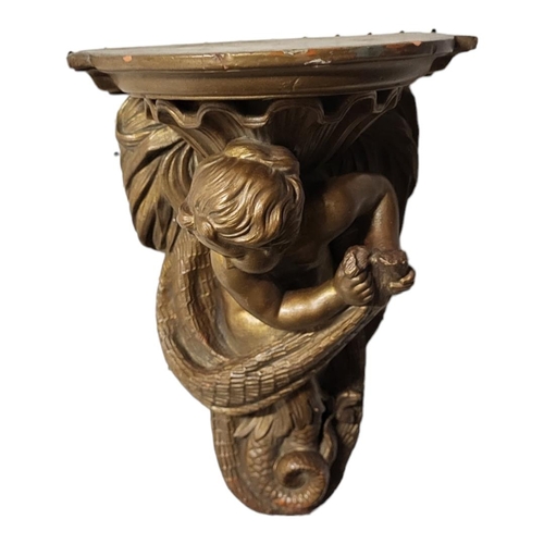 196 - AN EARLY 20TH CENTURY TERRACOTTA FIGURAL WALL BRACKET
Cast with a classical mermaid with fishing net... 