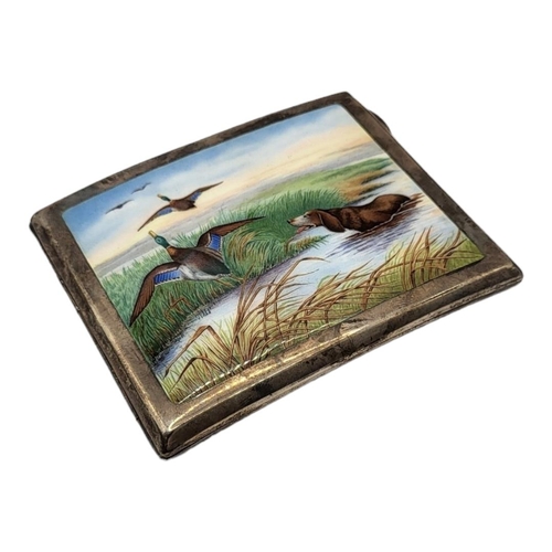 1A - AN EARLY 20TH CENTURY SILVER AND ENAMEL CIGARETTE CASE
Curved rectangular case with enameled hunting... 