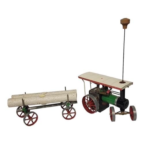 221 - MAMOD, A VINTAGE DIECAST MODEL STEAM ENGINE AND TRAILER 
Steam tractor with red, white and green liv... 