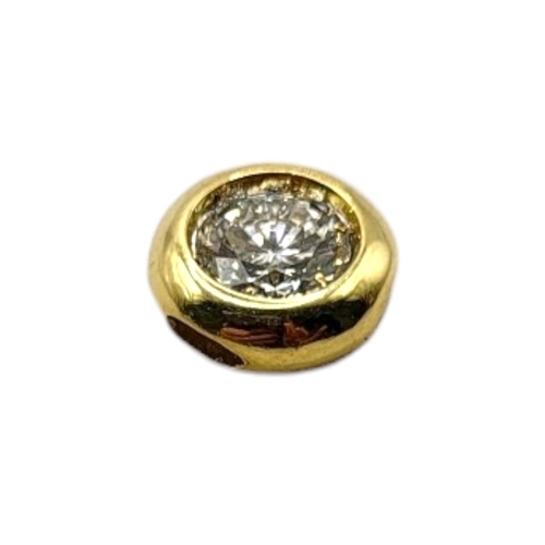 24 - A YELLOW METAL AND DIAMOND SOLITAIRE PENDANT
The single round cut diamond set in a collet mount.
(ap... 