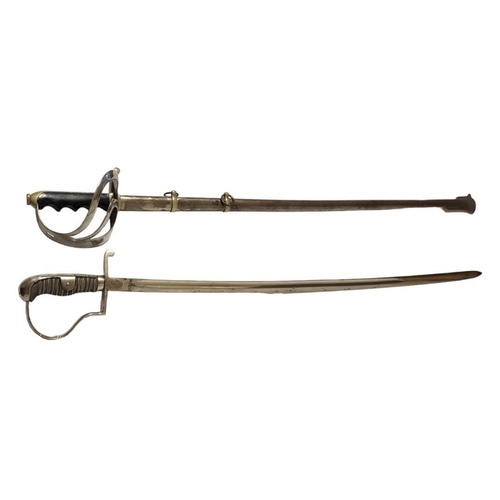 241 - AN EARLY 20TH CENTURY ITALIAN CAVALRY SWORD
Having a carved wooden handle, engraved decoration to bl... 