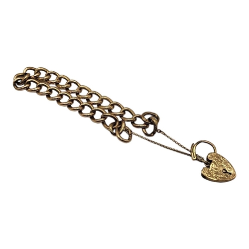 24A - AN EARLY 9CT GOLD OVAL CURB LINK BRACELET
Pierced textured links, with heart form clasp.
(approx 10c... 