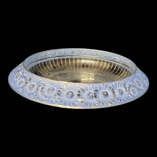 255 - LALIQUE, AN ART DECO MARQUERITES GLASS CENTREPIECE BOWL
Clear and blue frosted flowery border, beari... 