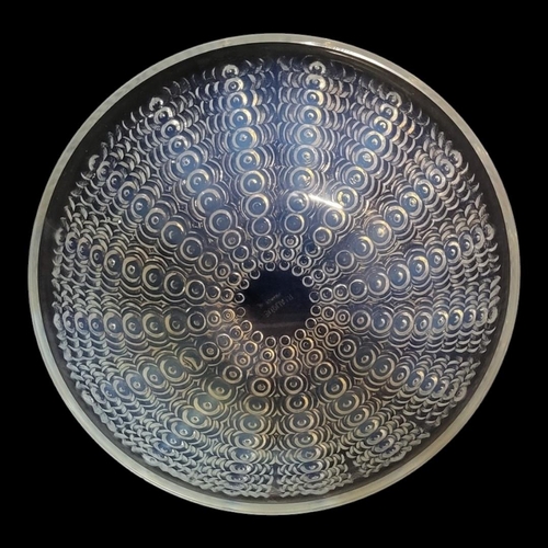 257 - LALIQUE, AN OPALESCENT CLEAR AND FROSTED ART GLASS BOWL 
Moulded design of raised spiral beads, stai... 