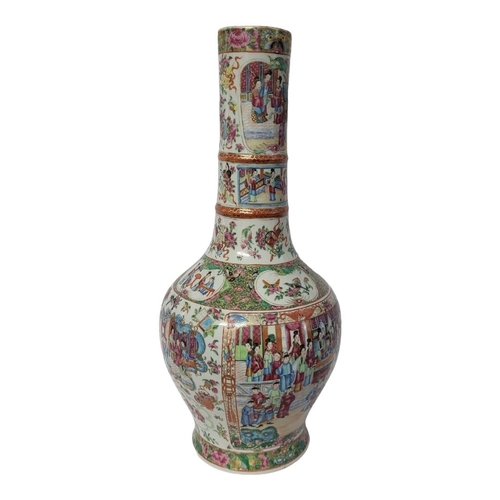 266 - A FINE CHINESE QING DYNASTY PORCELAIN CANTONESE EXPORT FAMILLE ROSE FIGURAL BOTTLE FORM VASE
Polychr... 