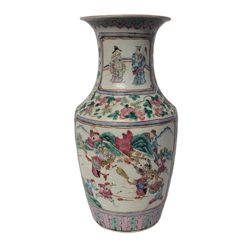 267 - A CHINESE QING DYNASTY CANTONESE PORCELAIN BALUSTER FORM VASE
Mandarin and battlefield pattern, enam... 