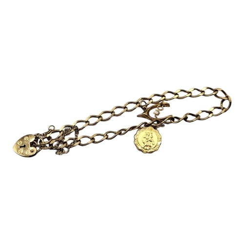 26A - A VINTAGE 9CT GOLD BRACELET
With a St. Christopher charm heart form clasp.
(approx 10cm)