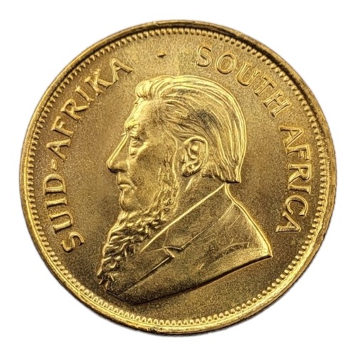 6A - A 22CT GOLD FULL 1OZ KRUGERRAND COIN, DATED 1975 
With portrait bust and springbok design to reverse... 