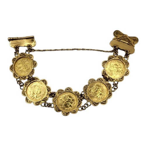 124A - AN EARLY 20TH CENTURY 22CT GOLD HALF SOVEREIGN FIVE COIN BRACELET
Having a row of five coins, dated ... 