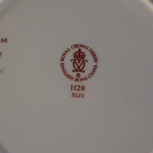 259 - ROYAL CROWN DERBY, A SET OF SEVEN BONE CHINA DINNER PLATES
Imari palette, two medium size Crown Derb... 