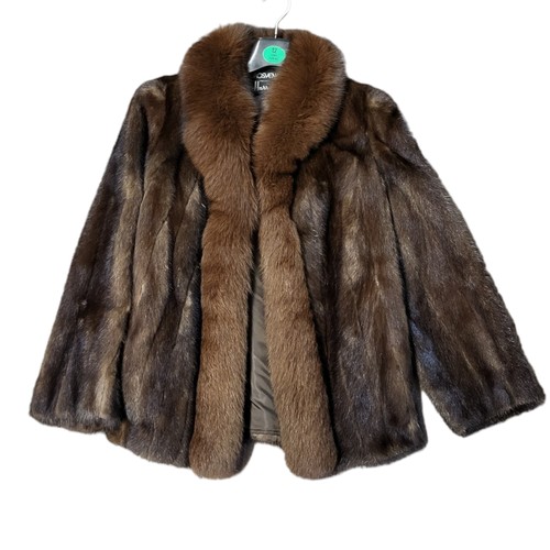 405 - GROSVENOR, HARRODS, A VINTAGE LADIES’ BROWN MINK FUR COAT
Together with Harrods, a full length dark ... 