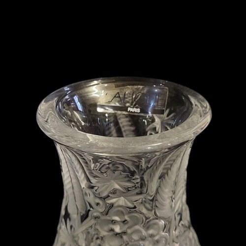 411 - LALIQUE, A VINTAGE EMBOSSED GLASS BALUSTER VASE
With floral decoration, etched mark to base.
(approx... 