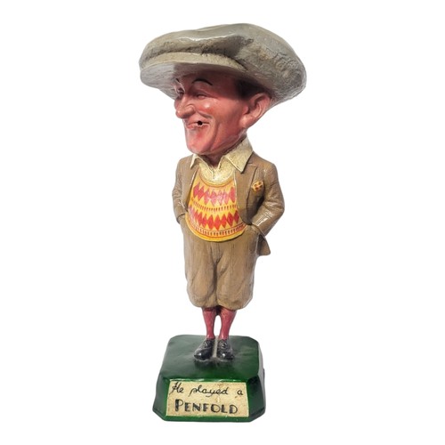 419 - HE PLAYED A PENFOLD, AN ORIGINAL EARLY 20TH CENTURY GOLF SHOP ADVERTISING STATUE. 
(51cm)

Condition... 