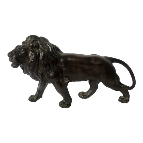 456 - A FINE JAPANESE MEIJI PERIOD, 1868 - 1911, PATINATED BRONZE MODEL OF AN IMPERIAL LION 
Naturalistica... 