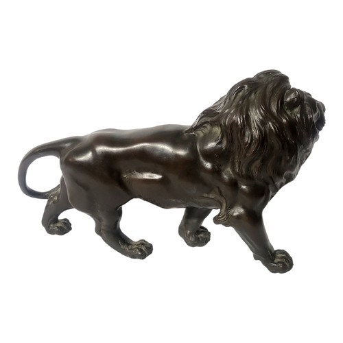 456 - A FINE JAPANESE MEIJI PERIOD, 1868 - 1911, PATINATED BRONZE MODEL OF AN IMPERIAL LION 
Naturalistica... 