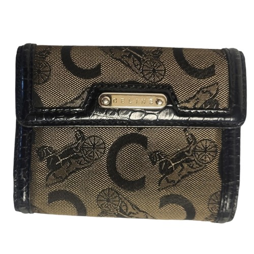 471 - CELINE, A VINTAGE LEATHER LADIES PURSE
Monogram fabric on black leather.
(approx 12cm x 9cm)

Condit... 