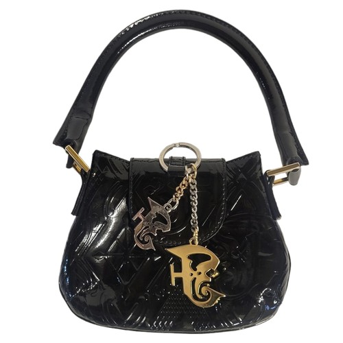 472 - GIANFRANCO FERRE, A VINTAGE PATENT LEATHER HANDBAG
Single handle with metallic monogram mounts and t... 