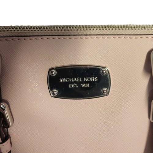 473 - MICHAEL KORS, A VINTAGE PINK LEATHER SHOULDER BAG
Twin handles with strap and chrome finish to mount... 