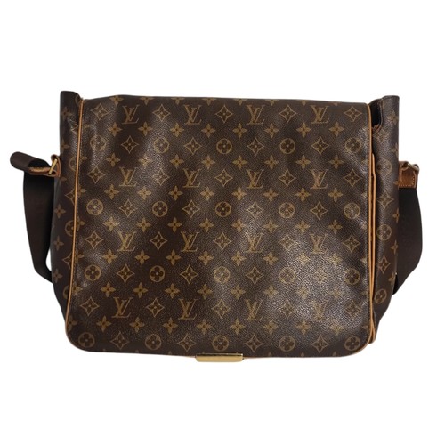 474 - LOUIS VUITON, A BROWN LEATHER MONOGRAM MESSENGER GENTLEMAN'S SHOULDER BAG
Having a single shoulder s... 