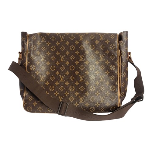 474 - LOUIS VUITON, A BROWN LEATHER MONOGRAM MESSENGER GENTLEMAN'S SHOULDER BAG
Having a single shoulder s... 