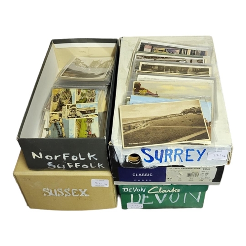 521 - FOUR BOXES CONTAINING APPROX 1000 EARLY  20TH CENTURY AND LATER POSTCARDS OF SUSSEX, SURREY AND DEVO... 