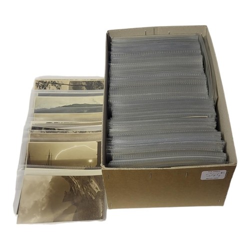 544A - A BOX CONTAINING APPROX 350 EARLY 20TH CENTURY POSTCARDS
English landscapes, all in individual trans... 